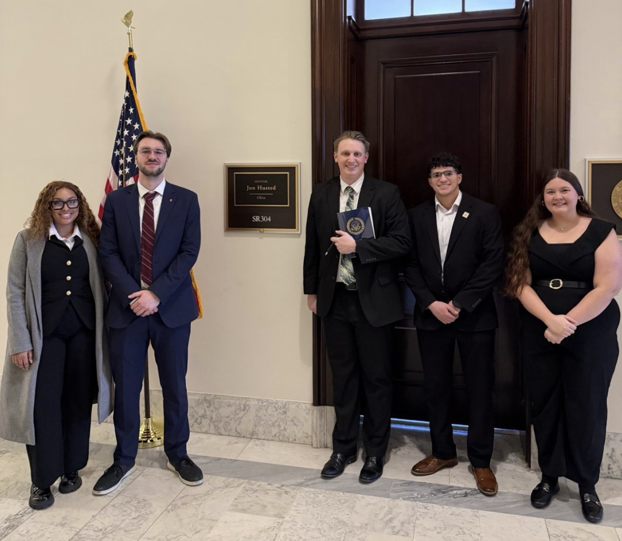 Krista Bair with USG delegation outside Senator Jon Husted's office in Washington D.C.