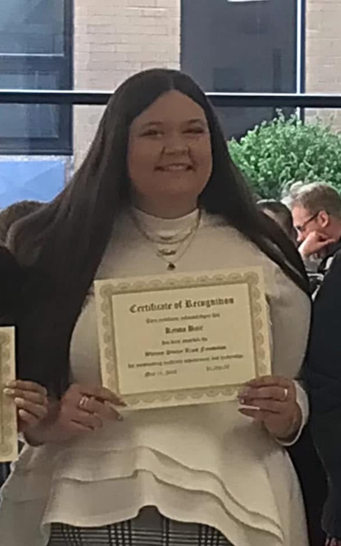 Krista Bair receiving the AultCare You Matter Scholarship